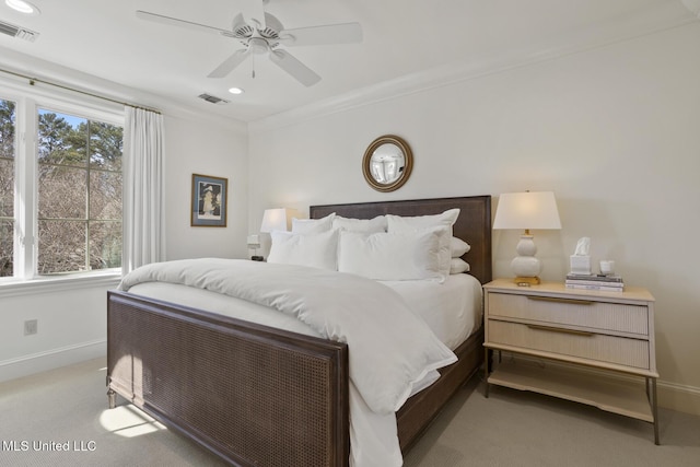 bedroom featuring carpet, baseboards, visible vents, and ceiling fan