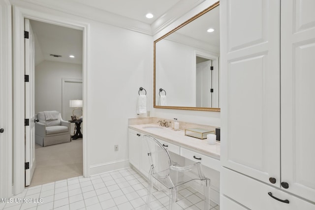 bathroom with tile patterned flooring, recessed lighting, vanity, baseboards, and crown molding