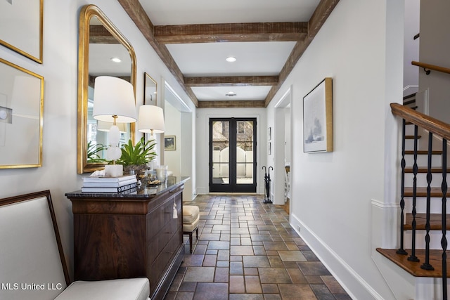 entryway featuring stone tile floors, baseboards, stairs, french doors, and beam ceiling