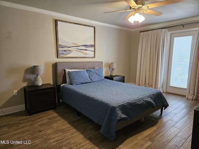 bedroom featuring hardwood / wood-style flooring, ceiling fan, and ornamental molding