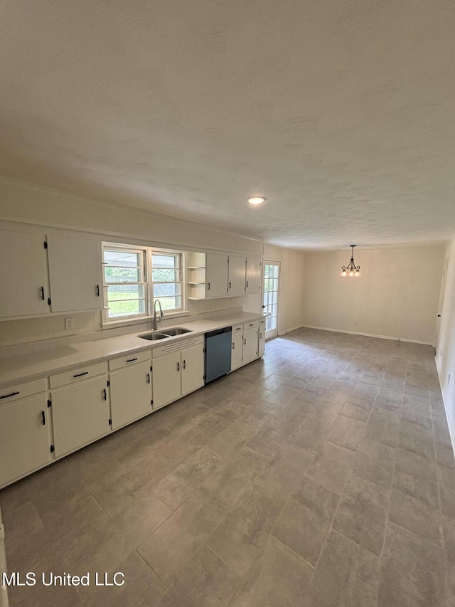 kitchen with a notable chandelier, a sink, dishwasher, plenty of natural light, and white cabinetry