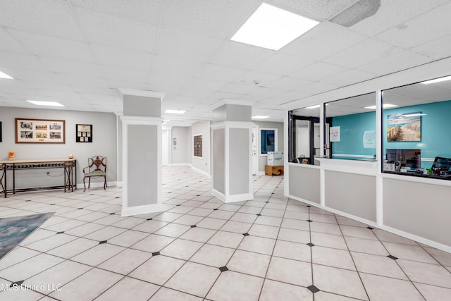 1130 Beach Blvd Unit 503, Biloxi, MS 39530 - unfurnished room featuring baseboards, a paneled ceiling, and decorative columns