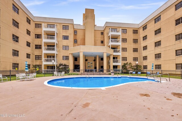 1130 Beach Blvd Unit 503, Biloxi, MS 39530 - community pool with a patio area