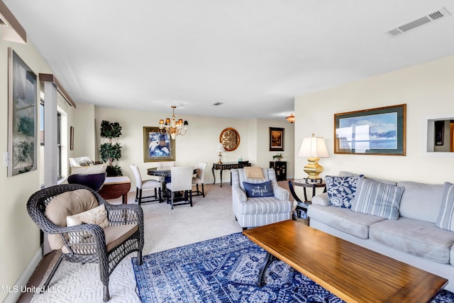 1130 Beach Blvd Unit 503, Biloxi, MS 39530 - carpeted living room with a chandelier and baseboards