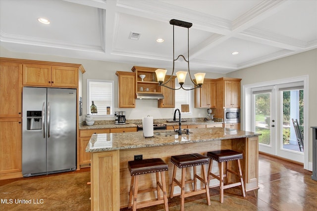 631 2nd St, Gulfport, MS 39501 - kitchen with appliances with stainless steel finishes, coffered ceiling, under cabinet range hood, recessed lighting, and a kitchen island with sink