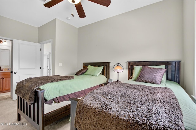 631 2nd St, Gulfport, MS 39501 - bedroom featuring light colored carpet, connected bathroom, and a ceiling fan