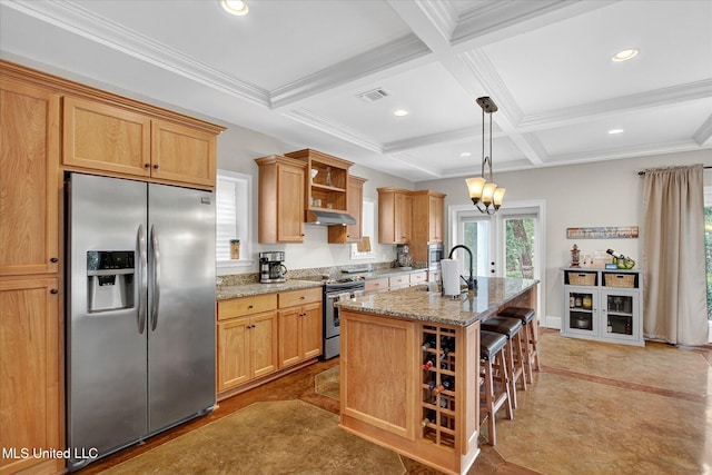 631 2nd St, Gulfport, MS 39501 - kitchen featuring stainless steel appliances, open shelves, under cabinet range hood, light stone countertops, and beam ceiling