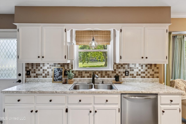 7465 Davidson Rd, Olive Branch, MS 38654 - kitchen with dishwasher, a sink, and white cabinets