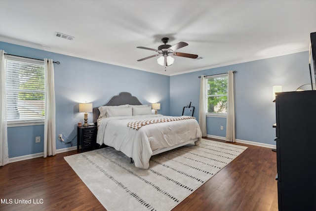 7465 Davidson Rd, Olive Branch, MS 38654 - bedroom featuring baseboards, dark wood-type flooring, ornamental molding, and ceiling fan