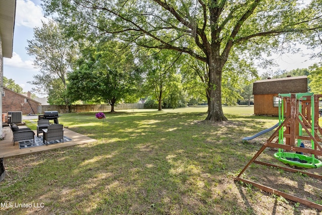 7465 Davidson Rd, Olive Branch, MS 38654 - view of yard with central AC unit, a playground, and an outdoor structure