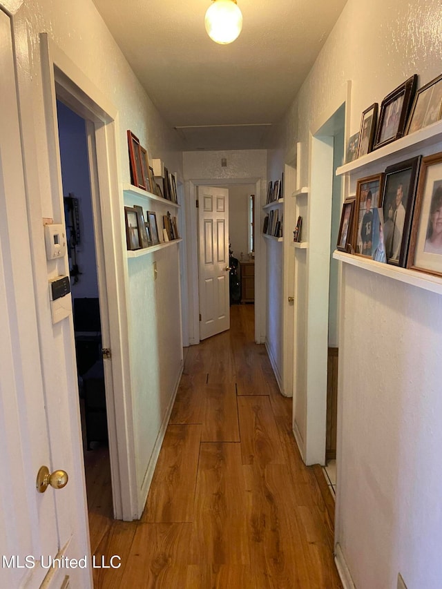 hallway featuring light hardwood / wood-style floors