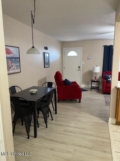 dining space featuring light hardwood / wood-style flooring