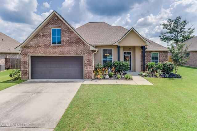 2018 Pelican Cir, Long Beach, MS 39560 - traditional home with brick siding, cooling unit, driveway, a front lawn, and a shingled roof