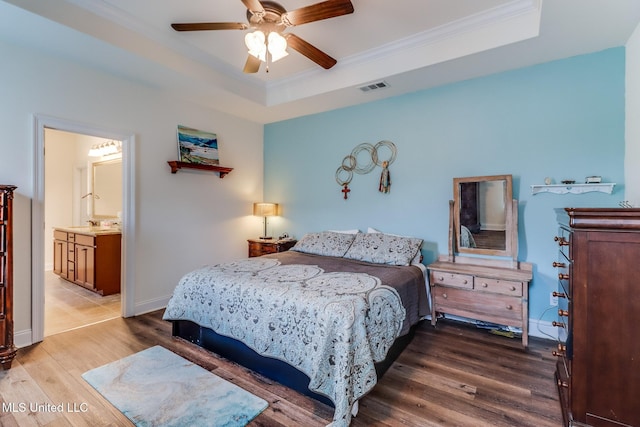 2018 Pelican Cir, Long Beach, MS 39560 - bedroom featuring a raised ceiling, wood finished floors, ornamental molding, ceiling fan, and baseboards