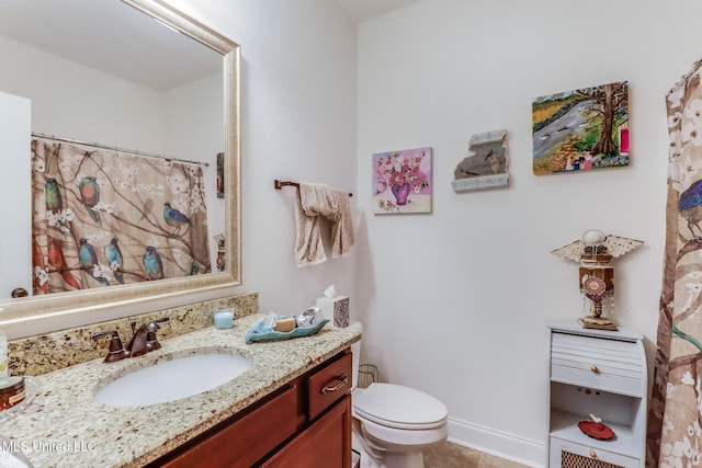 2018 Pelican Cir, Long Beach, MS 39560 - bathroom featuring vanity, toilet, tile patterned flooring, and a shower with shower curtain