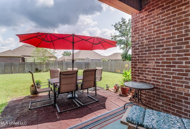 2018 Pelican Cir, Long Beach, MS 39560 - view of patio featuring outdoor dining area