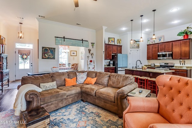 2018 Pelican Cir, Long Beach, MS 39560 - living room with ornamental molding, ceiling fan, wood finished floors, and recessed lighting