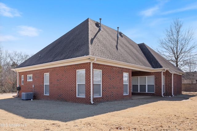 view of property exterior with central AC