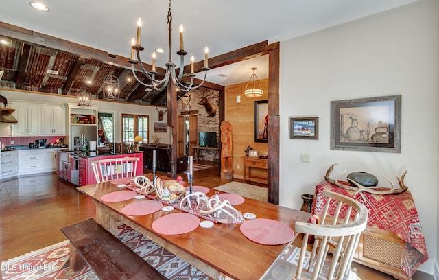 dining space with vaulted ceiling with beams, dark wood-type flooring, and a chandelier