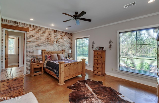 tiled bedroom featuring brick wall, multiple windows, ornamental molding, and ceiling fan