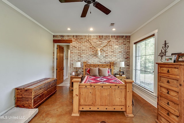 bedroom featuring ceiling fan, brick wall, and ornamental molding