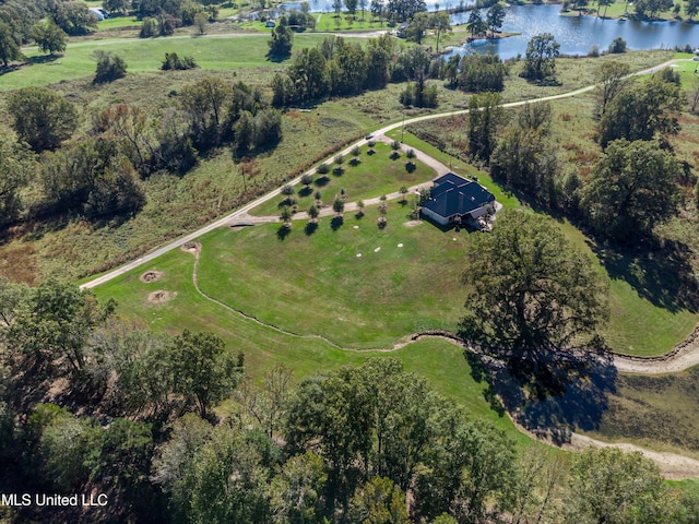 birds eye view of property with a water view and a rural view