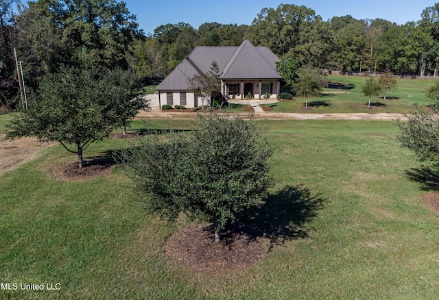 view of front of home with a front lawn