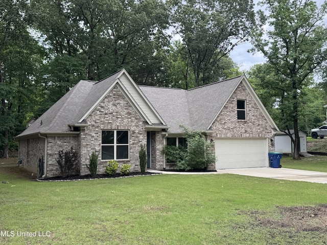 view of front of home featuring driveway, roof with shingles, brick siding, a front lawn, and an attached garage