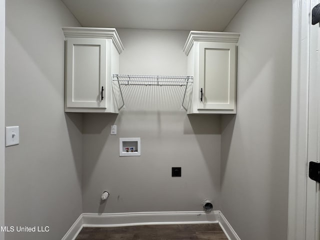 laundry area with dark wood-style flooring, laundry area, hookup for a washing machine, gas dryer hookup, and electric dryer hookup