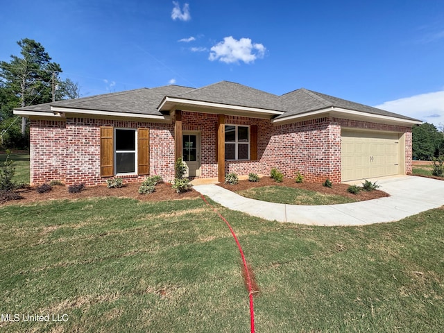 158 Walter Jones Rd, Mendenhall, MS 39114 - view of front facade with brick siding, a front lawn, an attached garage, concrete driveway, and a shingled roof