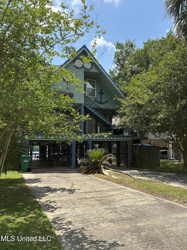 6327 Pontiac Dr, Kiln, MS 39556 - beach home with driveway and stairway
