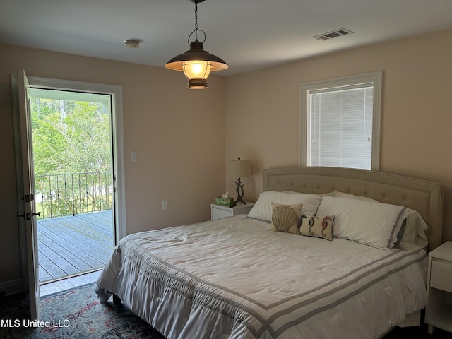6327 Pontiac Dr, Kiln, MS 39556 - bedroom featuring visible vents and access to outside