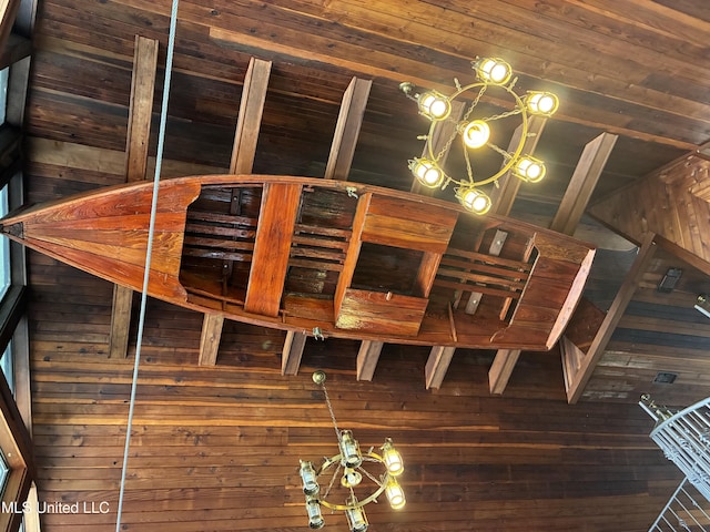 6327 Pontiac Dr, Kiln, MS 39556 - details with wood walls and a chandelier