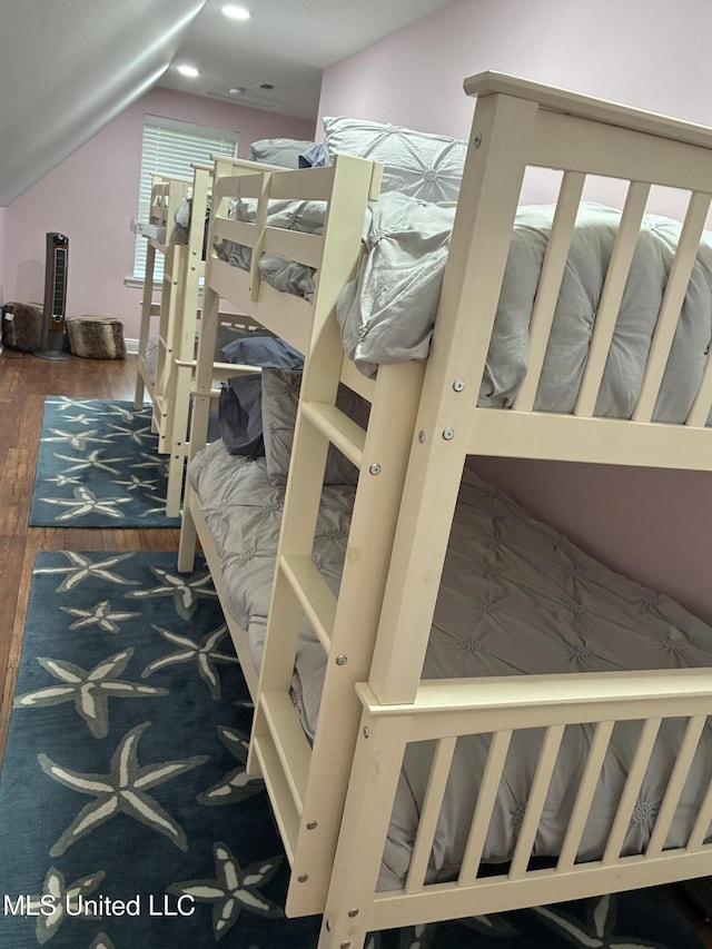 6327 Pontiac Dr, Kiln, MS 39556 - bedroom with wood finished floors and lofted ceiling