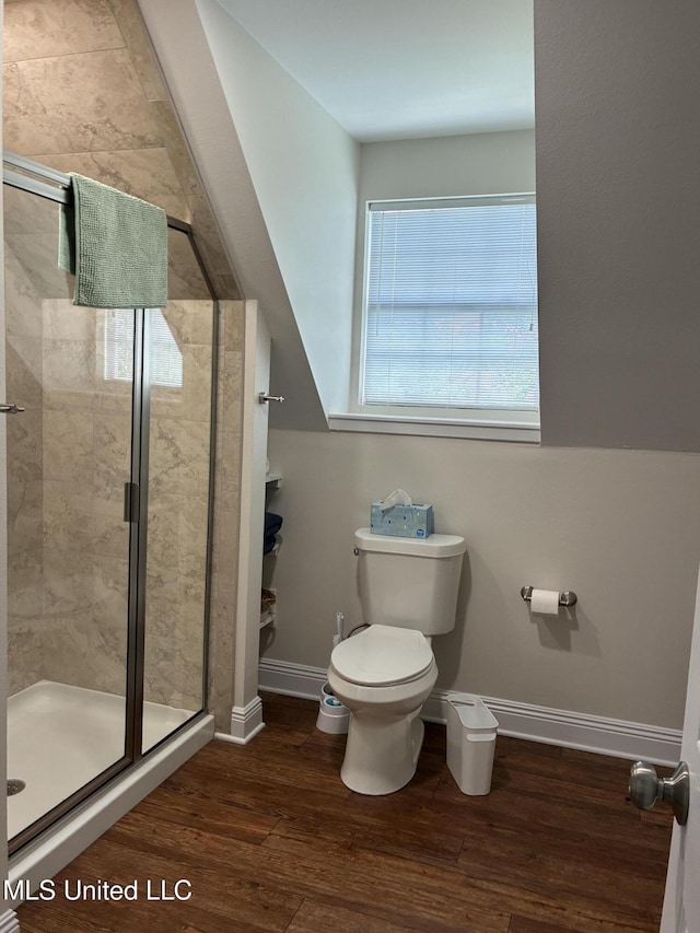 6327 Pontiac Dr, Kiln, MS 39556 - bathroom with toilet, a stall shower, wood finished floors, and baseboards