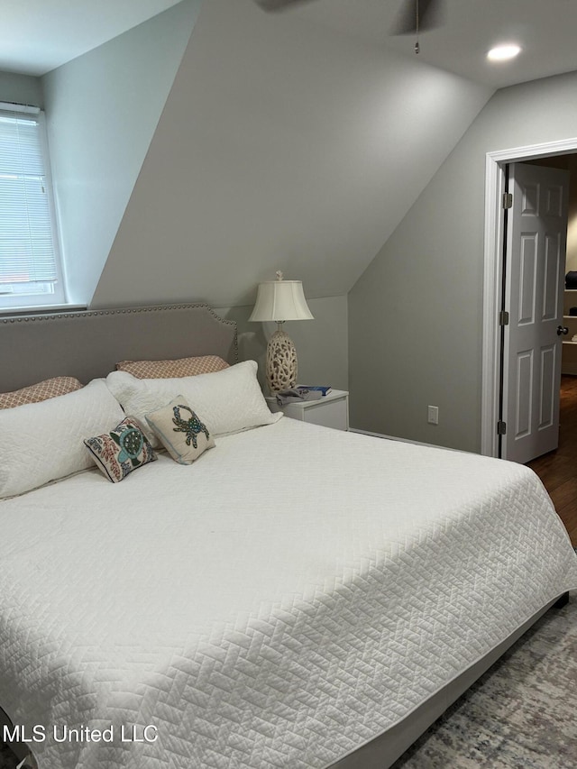 6327 Pontiac Dr, Kiln, MS 39556 - bedroom with dark wood finished floors, recessed lighting, and lofted ceiling