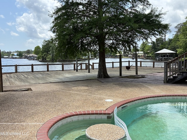 6327 Pontiac Dr, Kiln, MS 39556 - view of swimming pool featuring a water view and a fenced in pool