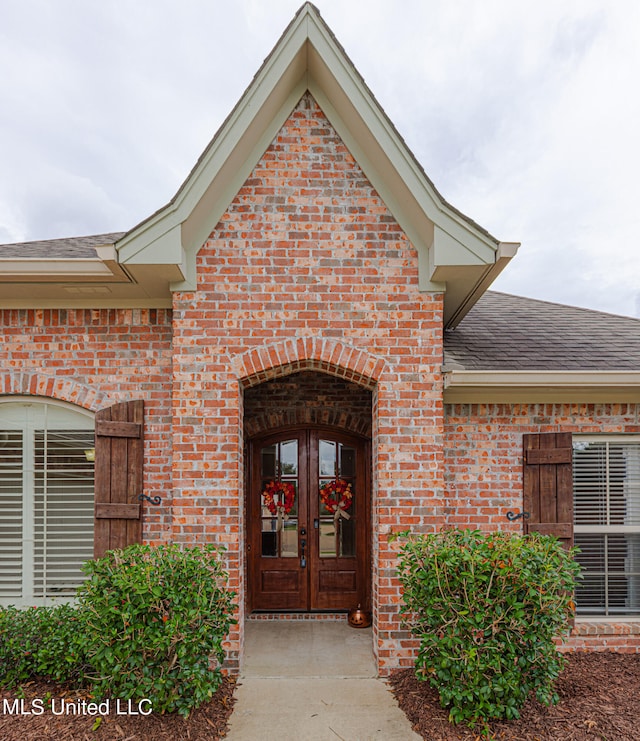 entrance to property featuring french doors