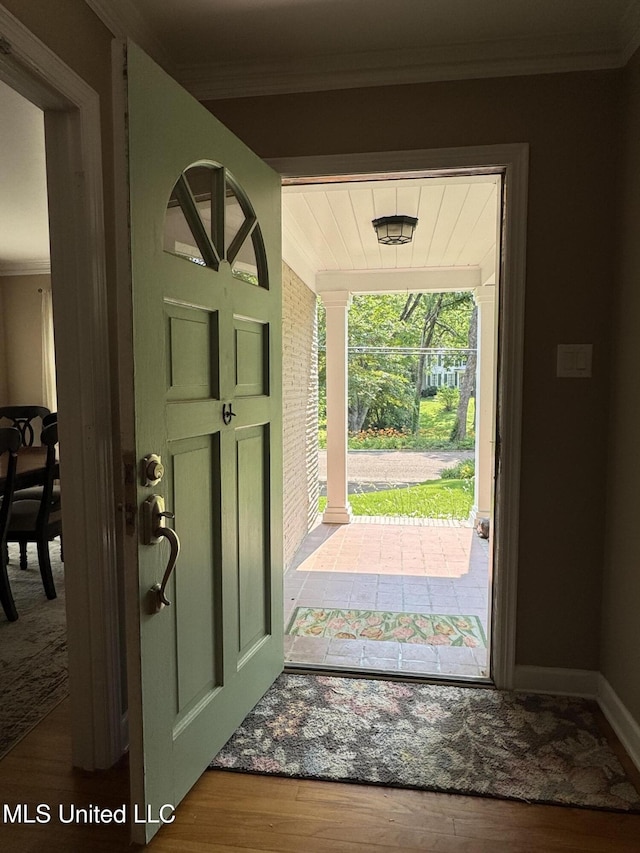 2293 Elm St, Hernando, MS 38632 - foyer entrance featuring ornamental molding and wood finished floors