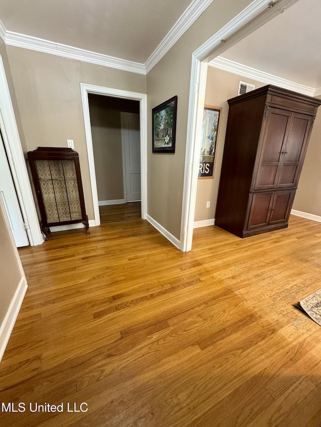 2293 Elm St, Hernando, MS 38632 - corridor featuring ornamental molding, light wood finished floors, and baseboards