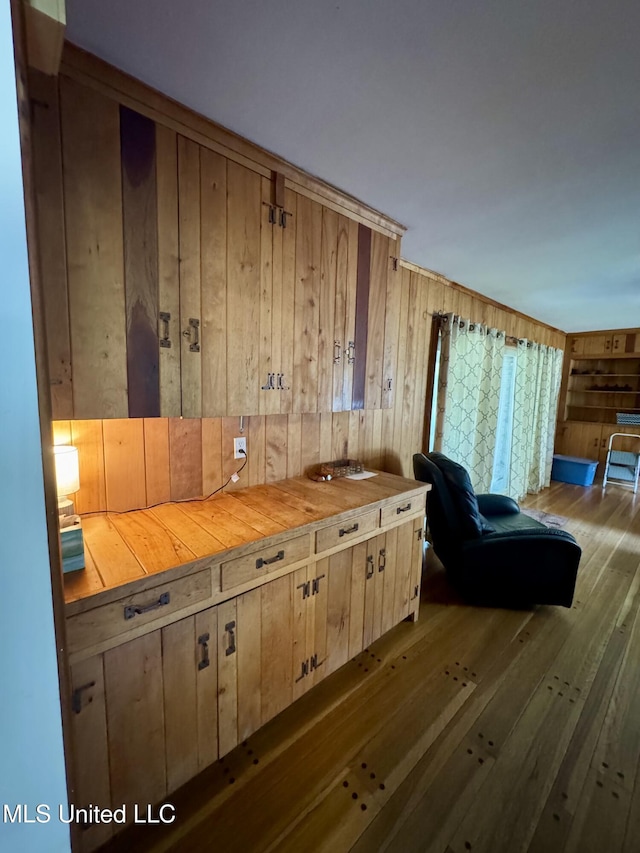 2293 Elm St, Hernando, MS 38632 - sitting room with wood walls and hardwood / wood-style flooring