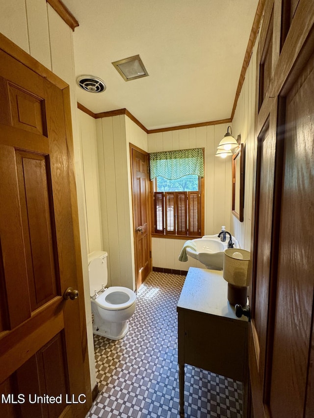 2293 Elm St, Hernando, MS 38632 - bathroom featuring crown molding, toilet, vanity, and tile patterned floors