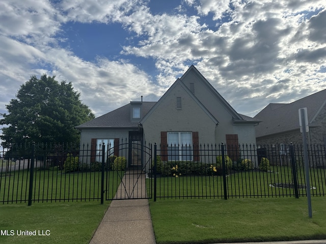 5894 Savannah Pkwy, Southaven, MS 38672 - tudor home with a gate and brick siding