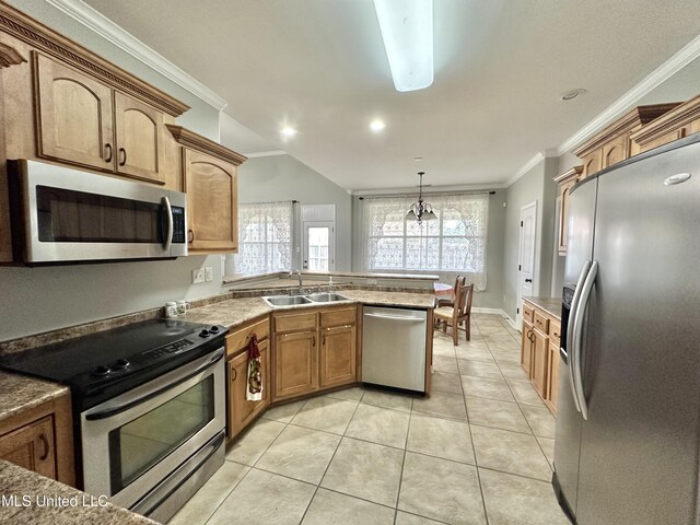 kitchen with light tile patterned floors, a peninsula, a sink, appliances with stainless steel finishes, and crown molding