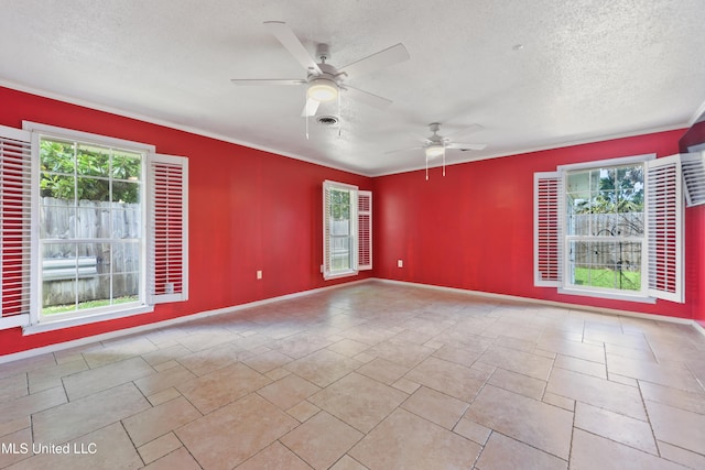 120 Pitcher Pt, Long Beach, MS 39560 - spare room featuring a ceiling fan, a textured ceiling, crown molding, and baseboards