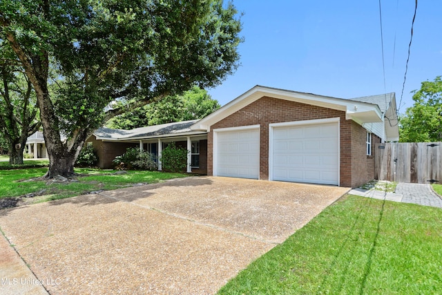 120 Pitcher Pt, Long Beach, MS 39560 - single story home featuring brick siding, an attached garage, and concrete driveway