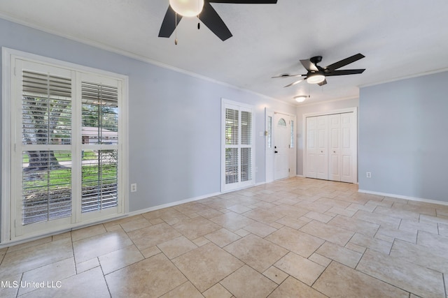 120 Pitcher Pt, Long Beach, MS 39560 - spare room with ceiling fan, plenty of natural light, ornamental molding, and baseboards