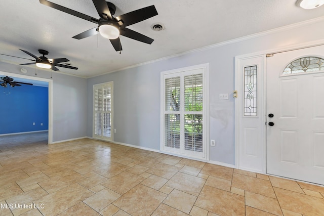 120 Pitcher Pt, Long Beach, MS 39560 - entryway with baseboards, a ceiling fan, ornamental molding, and light stone finish floors