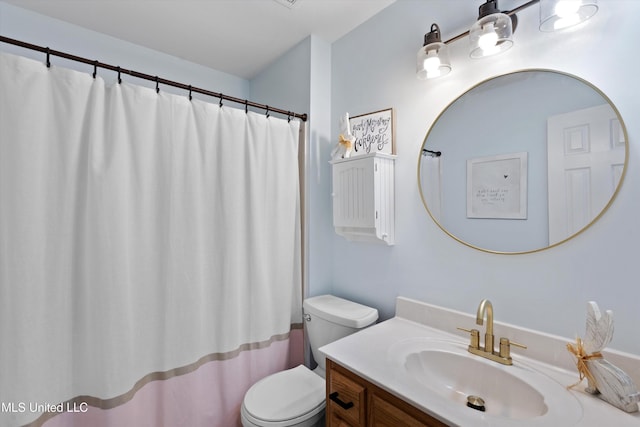 full bathroom featuring vanity and toilet