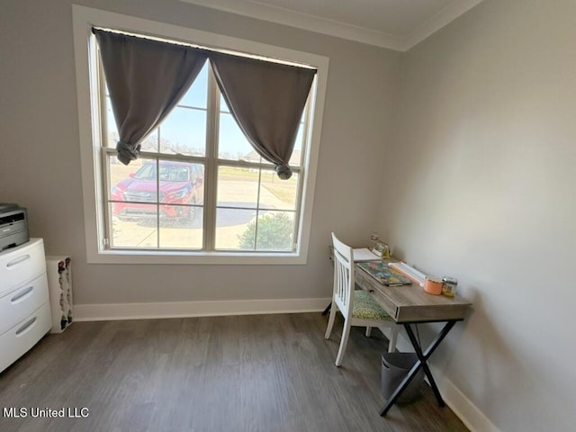 home office featuring ornamental molding, baseboards, and wood finished floors